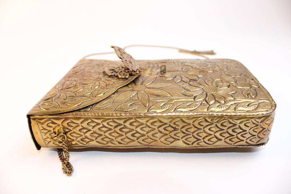 From St Xavier Gold Embossed Floral Mini Crossbody Bag