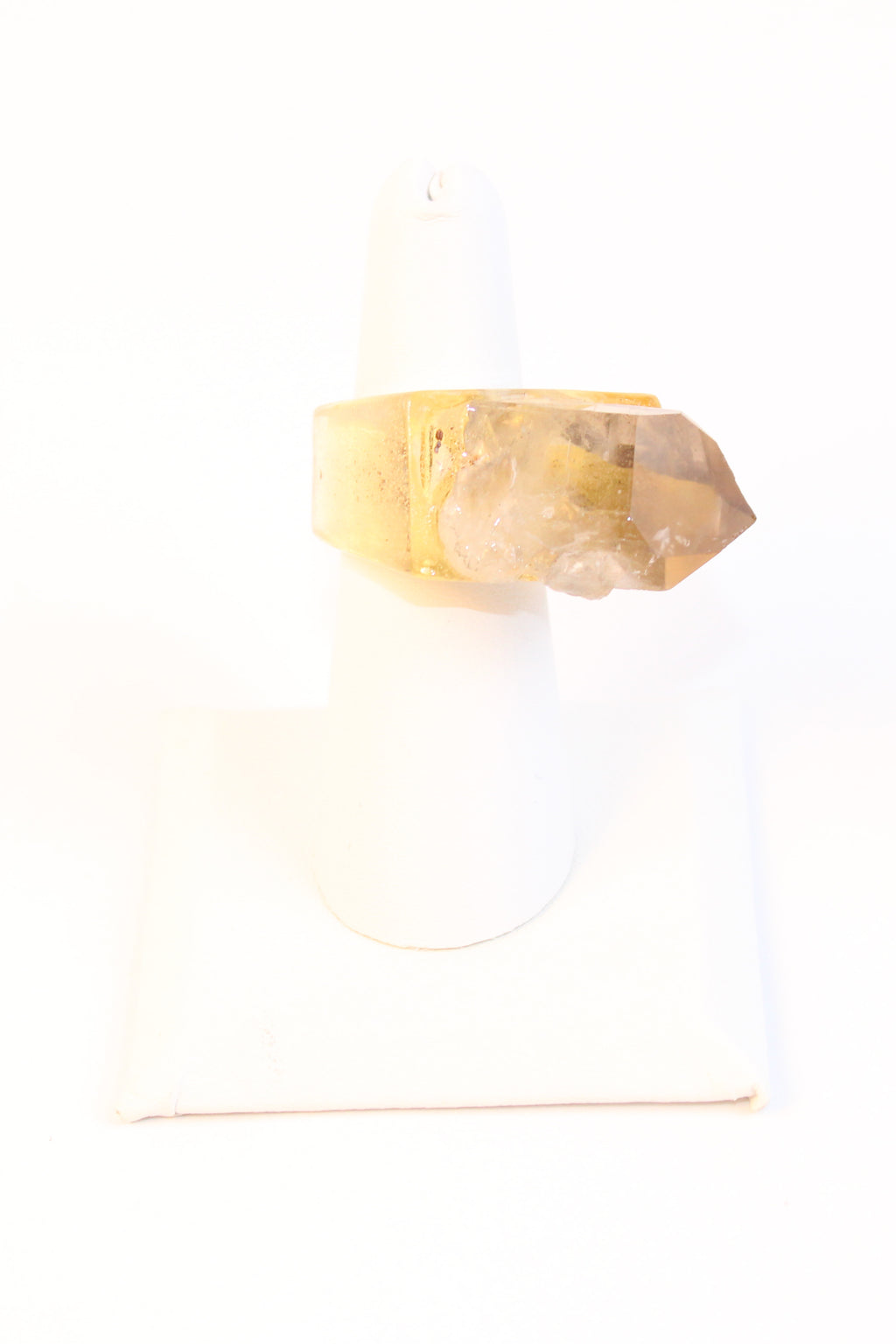 Gold tone statement ring with raw amethyst crystal