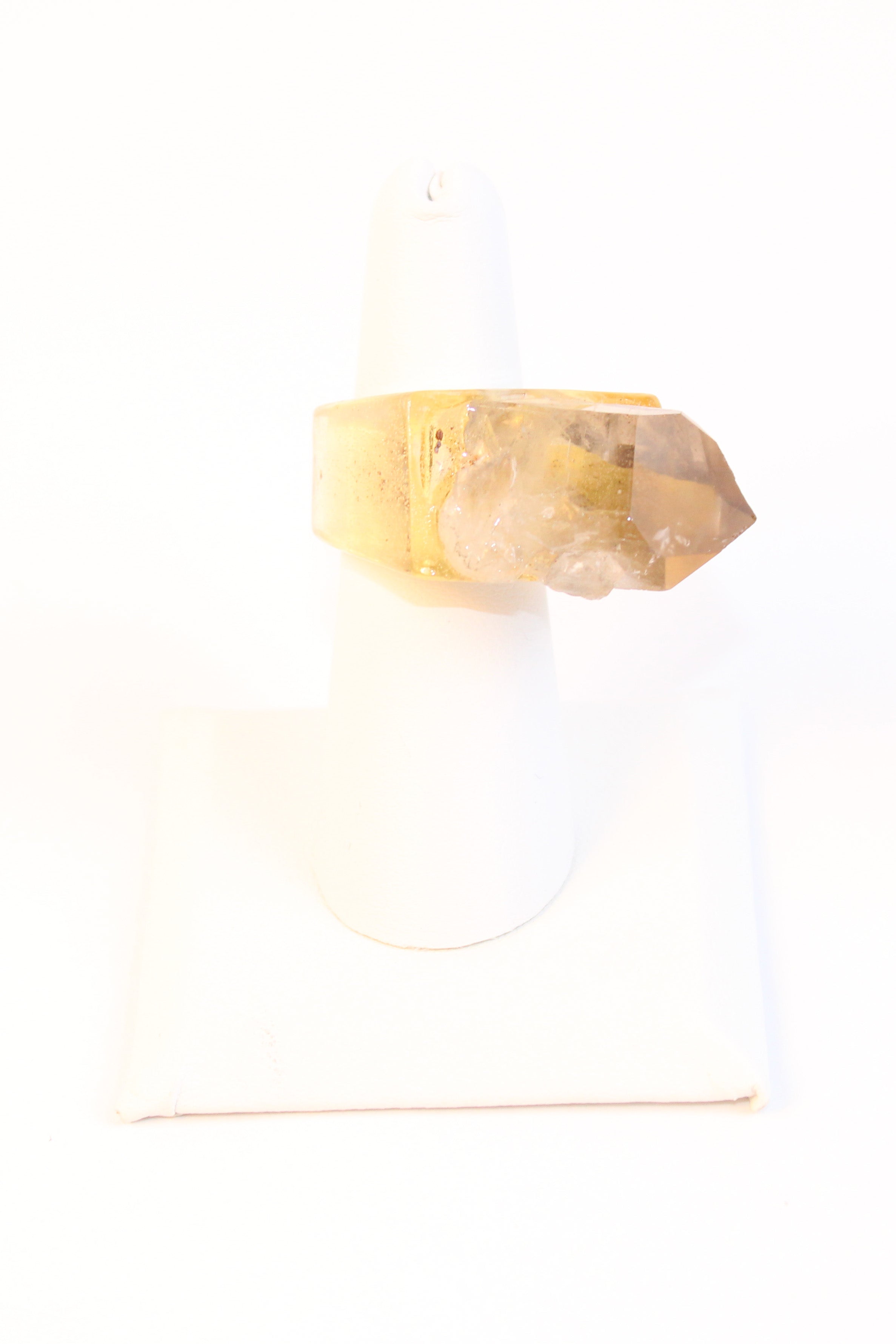 Gold tone statement ring with raw amethyst crystal