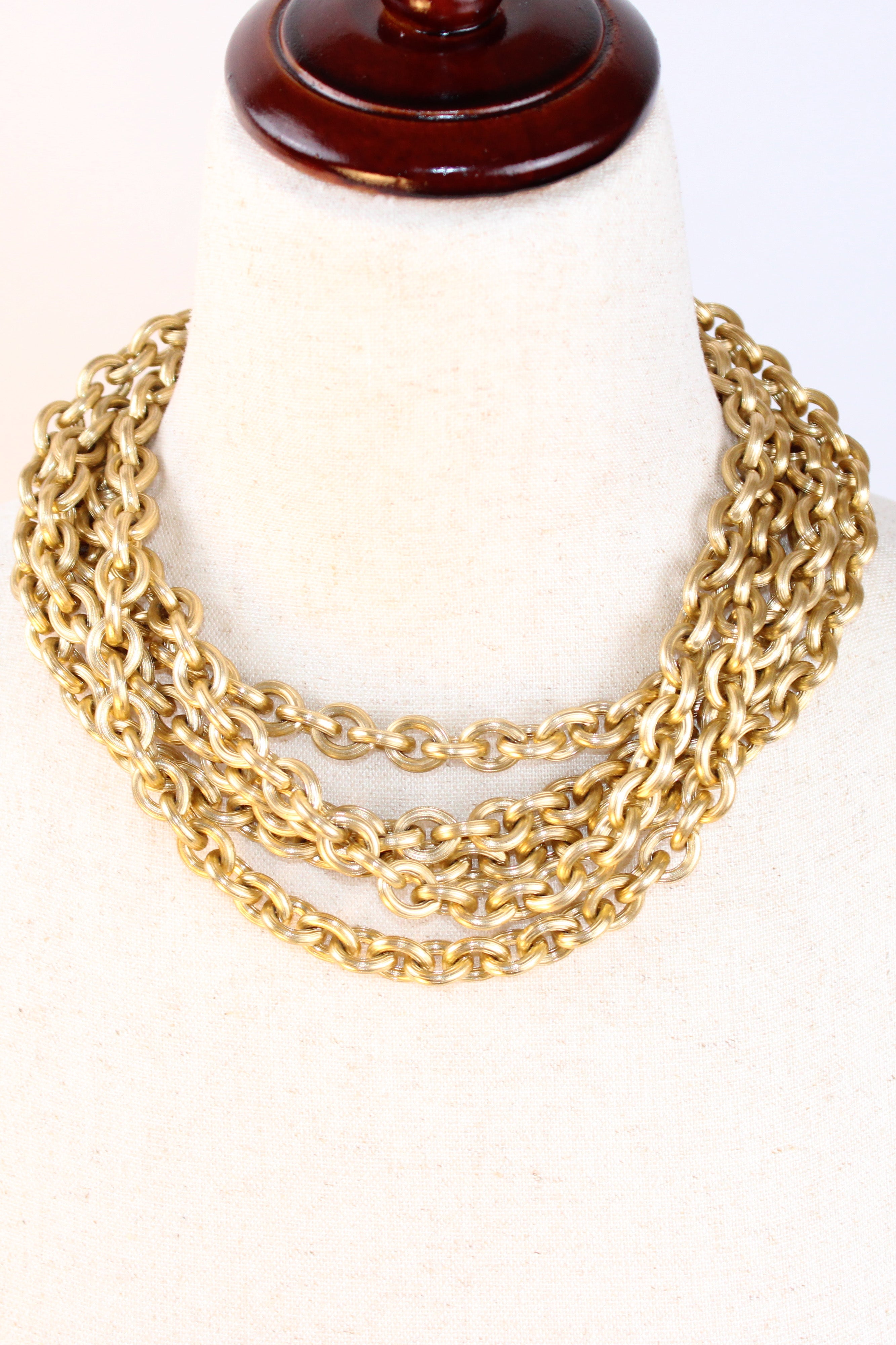 Gold tone multi strand chain necklace